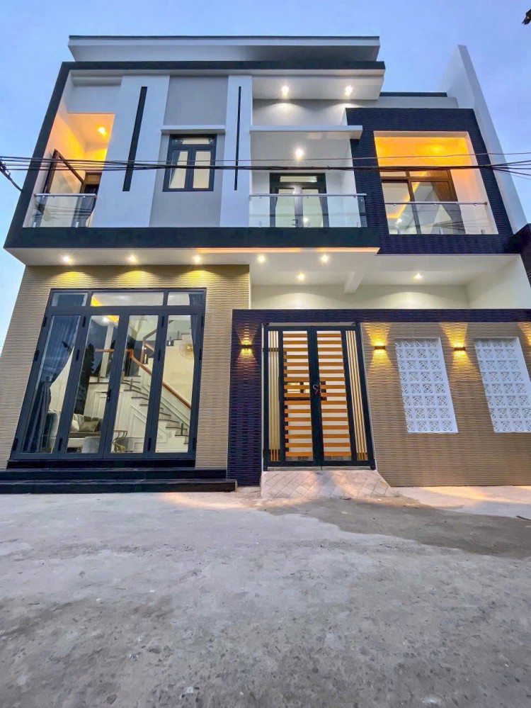 BÁN NHÀ  TRỆT LẦU Vị trí: nhà hẻm nhánh đường Nguyễn văn Linh, gần cây xăng số 9